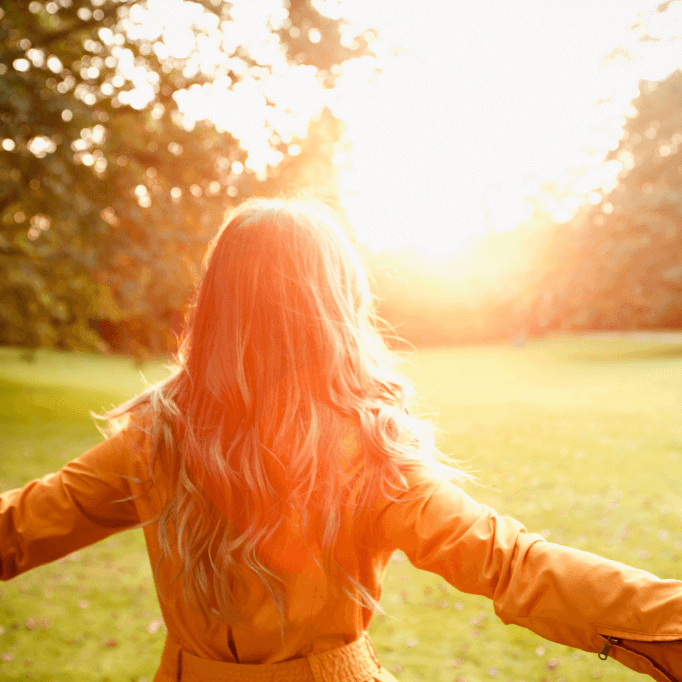 image of a woman absorbing sunlight 